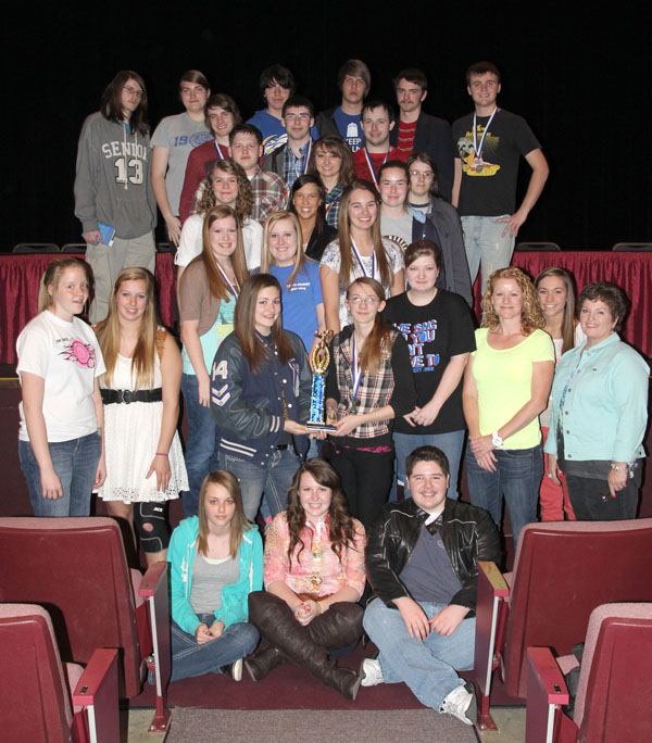 THIS GROUP OF STUDENTS from Alton High School took first place honors in Division II for medium-sized schools in the 28th annual Interscholastic Contest at Missouri State University-West Plains.  The team also placed third in the overall competition.  With their trophy are, front row from left, Kaitlin Jones, Carlee Buckner and Drew Hufstedler; second row:  Mary Alice Oesch, Kianna Friesz, Caty Chilcutt, Miranda Moore and sponsors Stephanie Miller, Chandra Hollis and Pamela Gilliland; third row:  Kari Russback, Candice McClanahan and Molly Steele; fourth row: Allison Wright, Rebecca Brandon and Alex Mills; fifth row:  Hayden Sisco, Ashlyn Hufstedler and Britney Nichols; sixth row:  Andy Chapko, Tom Koson and Tyler Sisco; back row:  Dillon Sykes, Haley Toy, Brent Murphy, Derrek Rackley, Dakota Keeney and Michael Barton.  Eric Honeycutt, Kalon Honeycutt and Noah Williams also were members of the team.  (Missouri State-West Plains Photo)