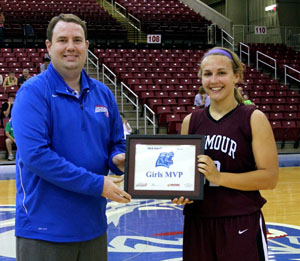 SARAH COOK, Seymour, was named the most valuable player in the girls game of the annual Grizzly All-Star Classic Saturday, April 19, at the West Plains Civic Center arena.  She scored 18 points to help lead her team to a 68-57 win.  Above, she receives her award from Missouri State University-West Plains Grizzly Basketball Head Coach Yancey Walker.  (Photo provided)