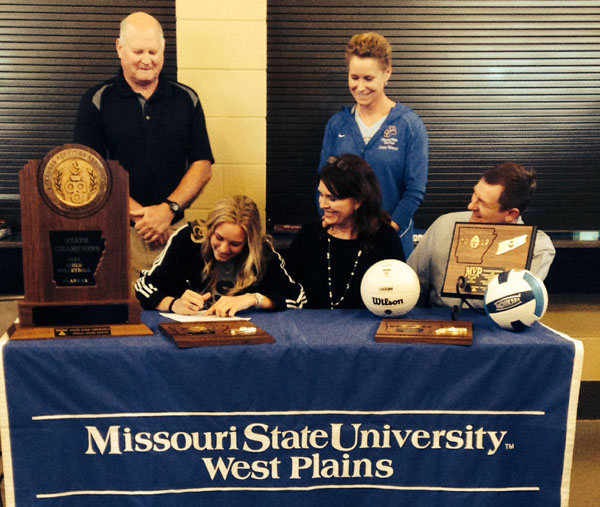 SUSANNAH KELLEY, a two-time all state setter from Jonesboro (Ark.) High School, has signed on to play volleyball with the Missouri State University-West Plains Grizzly Volleyball team beginning with the 2014 season.  The 5-foot, 8-inch Class 6A all-state honoree in 2012 and 2013 helped lead her Golden Hurricane team to the 2013 Arkansas Class 6A state championship last fall and earned MVP honors for the effort.  As a senior, she recorded 892 assists, 9.48 assists per game, 286 digs, and 3.04 digs per game.  On hand for the signing were, above front row from left, Susannah and her parents Kelly and Dana Kelley; back row, Jonesboro High School Head Volleyball Coach Craig Cummings and Grizzly Volleyball Head Coach Paula Wiedemann.  (Photo provided)