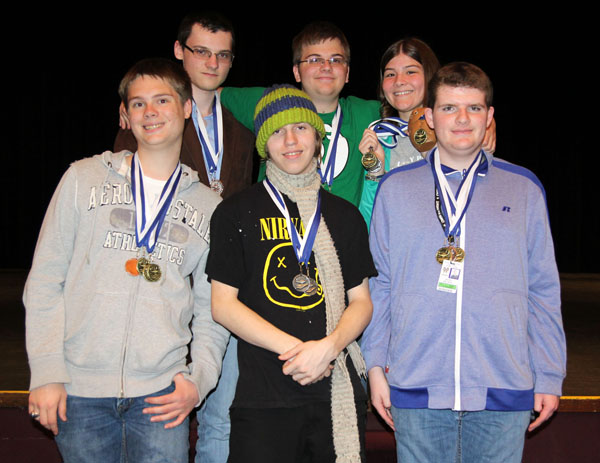 THE TEAM FROM MTN. HOME High School took top honors in the 29th annual Interscholastic Contest hosted by Missouri State University-West Plains on Friday, April 4.  Competition was held in three divisions based on school size, with first, second and third place winners announced in each division.  First, second and third place winners overall also were named.  The Mtn. Home contingent placed first overall, which gave them ownership of the “traveling trophy” that is given to the overall first place winner every year, and second in Division I.  Front row from left above are Lucas Dooley, Skylar Ronna and Noah Nelson.  Back row: Tommy Zulker, Evan Webb and Heather Morgan.  (Missouri State-West Plains Photo)