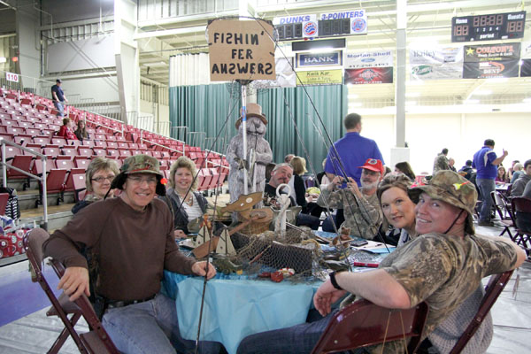 “FISHING FOR ANSWERS” was the theme of this table that placed first in the table-decorating contest of the 12th annual Trivia Night to benefit Grizzly Athletics at Missouri State University-West Plains.  Team members included, from left, Lou Citro, Danonne Citro, Vickie Taylor, Scott Taylor, Bob Frey, Beth Cooper and Tom Cooper.  Donny Frey also was a member of the team.  (Missouri State-West Plains Photo)