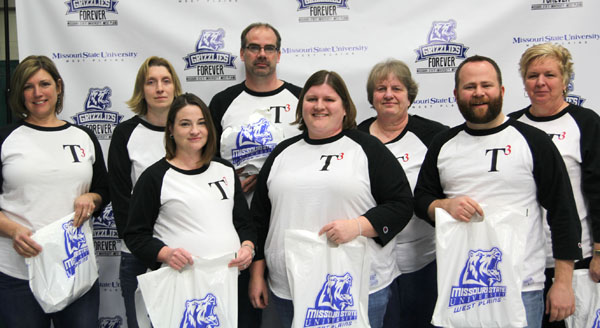 THE WEST PLAINS High School T3 Team place second in the 12th annual Trivia Night to benefit Grizzly Athletics at Missouri State University-West Plains.  Team members included, from left, Rhonda Richter, Krista Tate, Amy Schmitt, Nick Schmitt, Emily Gibson, Cyndi Wright, Josh Cotter and Janet Rackley.  (Missouri State-West Plains Photo)