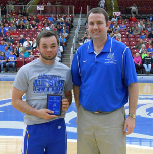 PRESTON GROESBECK, left, Mtn. Home, Ark., won the boys 3-point shooting competition at the annual Grizzly All-Star Classic Saturday, April 4, at the West Plains Civic Center.  He receives his award from Missouri State University-West Plains Head Coach Yancey Walker.  (Photo provided)