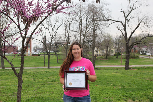 ANGELA REDBURN, groundskeeper/general maintenance worker at Missouri State University-West Plains, has received certification as an arborist from the International Society of Arboriculture (ISA), a worldwide professional organization headquartered in Champaign, Ill., dedicated to fostering a greater appreciation for trees and to promoting research, technology and the professional practice of arboriculture.  To receive certification, Redburn was tested extensively about tree varieties and identification, proper methods to plant and trim trees, and evalutation of tree health.  With funding from the Missouri Department of Conservation’s TRIM Grant program, university officials were able to purchase the materials needed for Redburn to study for the certification and to attend a one-week ISA exam training program in Virginia.  Redburn has worked full time for the university for the past three years after spending several years as a part-time student worker.  With her new certification, Redburn will lead the campus’ tree care and maintenance programs and train fellow groundskeepers on proper tree care.  (Missouri State-West Plains Photo)