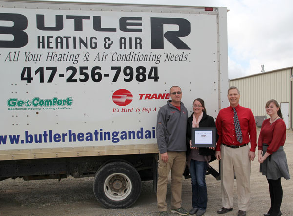 BUTLER HEATING AND AIR is one of the “Grizzly Givers” for this year’s Missouri State University-West Plains’ “True Blue” Annual Auction, set for April 10 at the West Plains Civic Center.  Doors will open at 5:30 p.m., and auction activities will get underway at 6.  Tickets are $35 per person, or $350 will reserve table seating and tickets for eight, organizers said.  Tickets can be purchased by calling 417-255-7240 or emailing WPDevelopment@MissouriState.edu.  With “True Blue” as this year’s theme, guests are being asked to wear blue.  From left are Butler Heating and Air owners Jeff and Becky Butler, Missouri State-West Plains Director of Development Joe Kammerer, and Development Events Coordinator Eryn Walters.  (Missouri State-West Plains Photo)