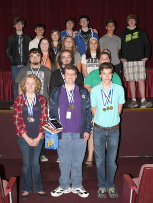 THE TEAM FROM MTN. HOME High School took top honors in the 30th annual Interscholastic Contest hosted by Missouri State University-West Plains on Friday, April 10.  Competition was held in three divisions based on school size, with first, second and third place winners announced in each division.  First, second and third place winners overall also were named.  The Mtn. Home contingent placed first overall, which gave them ownership of the “traveling trophy” that is given to the overall first place winner every year, and third in Division I.  Team members included, front row from left, Charli Partney, Noah Nelson and David Lewis; second row:  Sam Buel Johnny Woods and Bailee Carter; third row:  Jayden Phillips Sydney Blevins and Hannah Strider; back row:  Kyle Chandler, Ben Eggensperger, Kate Vawter, Lucas Johnson, Tyler Vincent, David Manolof and Jacob Cotterell.  (Missouri State-West Plains Photo)