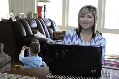 MICHELLE BRYAN, a stay-at-home mom in Willow Springs, takes online courses through Missouri State University-West Plains because it’s more convenient for her active schedule.  Beginning this fall, students like Bryan will be able to complete the entire Associate of Arts in General Studies degree online.  (Missouri State-West Plains Photo)