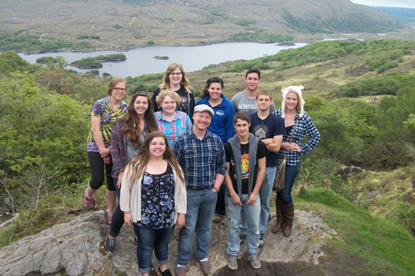 LOUGH LEANNE, or “Lake of Learning,” along the Ring of Kerry in Ireland provided a picturesque backdrop for this group photo of students and Director Alex Pinnon of the Missouri State-West Plains Darr Honors Program.  The Ring of Kerry is a 179-kilometer tourist route through the Irish countryside that gives visitors panoramic views of the country’s coast and lakes.  Front row from left are Ashton Garner, West Plains; Pinnon; and Sam McLean, West Plains.  Second row:  Morgan Kinder and Emily Schilmoeller, both of West Plains; and Nick Martin, Thayer.  Back row:  Kayla Harris, Seymour; Mallory Kjar, Springfield; Shelby Harris, Dora; Mike Driscoll, Brandsville; and Kara Cook, West Plains.  (Photo courtesy Alex Pinnon)