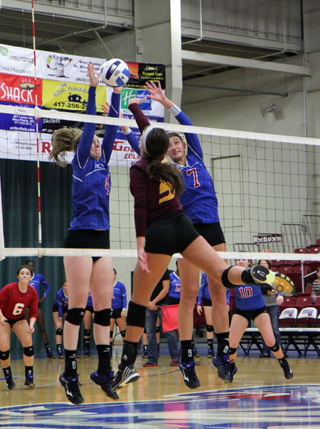 GRIZZLIES STEPHANIE PHILLIPS (No. 4) and Ashley Bishton (No. 7) go up to block a shot during Tuesday’s match against Indian Hills Community College at the West Plains Civic Center.  The Grizzlies lost to Indian Hills 18-25, 20-25, 28-30.  (Missouri State-West Plains Photo)