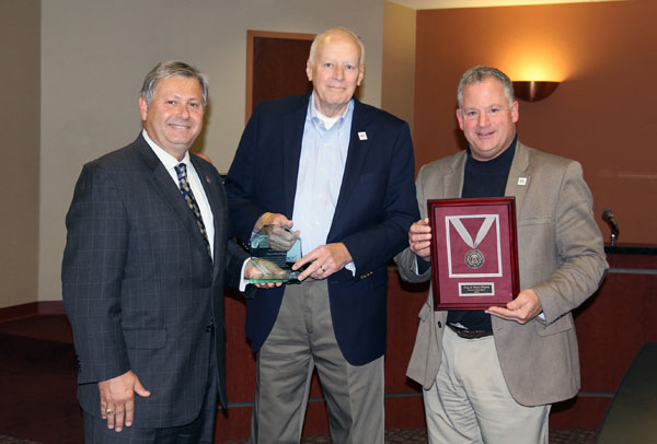 THE CITY OF WEST PLAINS has been recognized as a member of the Missouri State University Founders Club at the Bronze Medallion level for its “significant” contributions to the Missouri State-West Plains campus. The club, established in 1983, recognizes “those significant donors whose financial support provides and encourages many aspects of higher education for Missouri State University.” Individuals, businesses, foundations and organizations which make a minimum commitment of $10,000 in cash, securities or real or personal property to the Missouri State University Foundation meet the criteria for membership, according to university officials. Those receiving Bronze Medallion status must have given at least $25,000, officials added. Above, Missouri State-West Plains Chancellor Drew Bennett, left, presents the award and medallion to West Plains Mayor Jack Pahlmann, center, and City Administrator Tom Stehn. (Missouri State-West Plains Photo)