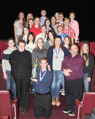 THE TEAM FROM Houston High School took top honors in Division II and third place overall in the 31st annual Interscholastic Contest hosted by Missouri State University-West Plains on Friday, April 8.  With their trophy are, kneeling, Jefferson Thomas; standing, front row from left, Chandler Postlewait, Abby Dzurick, Madison Franklin, sponsor Jason Pounds and Kaitlyn Root; second row: Kyelor Curtis, Yuka Katogi, Nikki Coleman and Elizabeth Scott; third row: Camryn Scheets, Sammy Garrett and Lewis Miller II; fourth row: Tayler Ward, Chandra Hubbs, Hendrik Hogertz and Tim Schmutzler; fifth row: Laken Neal, Abbey Slocum and Elexis Calhoun; back row: Alyssa Hayes, Monica Hunter, Skylur Malam and Alyssa Elliott.  (Missouri State-West Plains Photo)