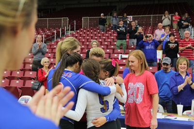 THE “CORE FOUR” SOPHOMORES, from left, Stephanie Phillips, Blanca Izquierdo, Autumn Reese and Maja Petronijevic gather around Grizzly Volleyball Head Coach Paula Wiedemann to present her a plaque honoring her 20th season with the program. Looking on is Assistant Coach Briana Walsh. (Missouri State-West Plains Photo)