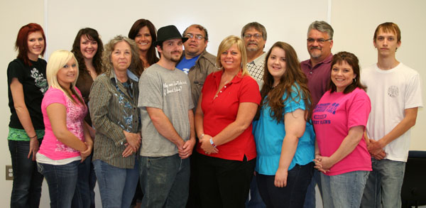 SEVERAL STUDENTS participating in Missouri State University-West Plains’ federally-funded TRIO Student Support Services program were awarded a total of $10,000 in scholarships from program funds. To be eligible for a scholarship, the student must be enrolled full time and an active participant in the program, which provides comprehensive academic support services to low income, first generation and disabled college students in an effort to increase their postsecondary educational success. Students selected to receive the scholarships had the highest cumulative grade point averages among all program participants, TRIO Coordinator Karen Ryburn said. Students receiving scholarships include, front row from left, Tamber Weber, Eminence; Connie Womack, Birch Tree; Brian Hite, West Plains; Tiffany Green, Mtn. View; Emily Steelman, Summersville; and Debbie Fox, West Plains. Back row: Macee Smith, Thayer; Tiffany Sullivan, Winona; Elizabeth Kusel, West Plains; Oscar Navarrete, West Plains; Del Davis, Norwood; Kenneth Franke, Thayer; and John Brooks, Dora. Also receiving scholarships were Jennifer Burton, Thayer; Susan Schulz, West Plains; Courtney Sillyman, Bucyrus; and Lee Stone, West Plains. (Missouri State-West Plains Photo)