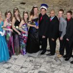 MEMBERS OF THE 2013 Missouri State University-West Plains Homecoming Court gather around this year’s king and queen in the lobby of the West Plains Civic Center for photos following the crowning, which took place at halftime of the Feb. 19 basketball game between the Grizzlies and Three Rivers College Raiders of Poplar Bluff, Mo. From left are 2013 Homecoming Queen candidates Abby Luallin of Conway, Hope Harris of West Plains, Anna Cantrell of Conway and Nikki Rieken of Ava; 2012 Grizzly Homecoming Queen Kristi Ary, West Plains, who crowned the 2013 queen; 2013 Homecoming Queen Krista Poole, Jefferson City; 2013 Homecoming King Taler Sutherland, West Plains; 2012 Homecoming King Tony Ary, West Plains, who crowned the 2012 king; and 2013 Homecoming King candidates T.J. Wallis of New Bloomfield, John Beam of West Plains, Cody Skidmore of Conway, and Dalton Stockton of West Plains. (Missouri State-West Plains Photo).