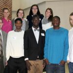 SEVERAL INTERNATIONAL STUDENTS at Missouri State University-West Plains introduced themselves and shared information about their home countries at the Friends of the Garnett Library’s monthly meeting Nov. 14 at the Lybyer Technology Center. The students, all of whom participate in Grizzly Athletics, were accompanied by Grizzly Basketball Head Coach Yancey Walker and Grizzly Volleyball Head Coach Paula Wiedemann. Front row from left, Walker and basketball players Jahir Cabeza, a native of Colon, Panama, who now lives in Hampton, Ga.; Thimothee Troussel, Massy, France; Terrel Martin-Garcia, London, England; and Vladimir Milosevic, Belgrade, Serbia. Back row: Wiedemann and volleyball players Gabby Edmondson, Christchurch, New Zealand; Penny Liu, Nanjing, China; and Guro Froberg, Askim, Norway. (Missouri State-West Plains photo)