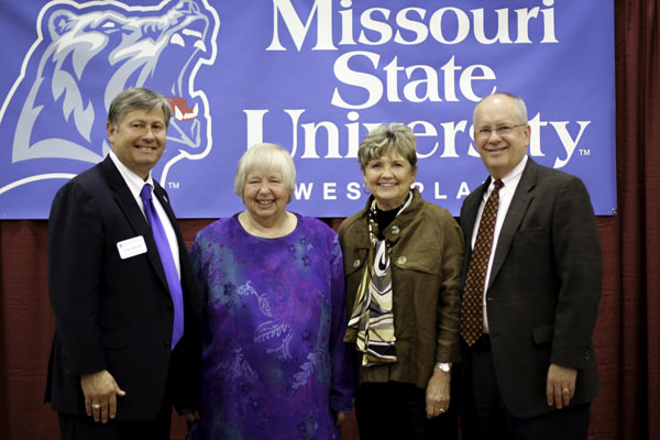 PLAQUES WERE PRESENTED to this year’s Distinguished Alumni Award recipient Jenny Underwood, Thayer, and Distinguished Faculty/Staff Award recipient Kay Garrett, West Plains, during the annual Missouri State University Alumni Association’s spring picnic for alumni and friends Thursday, May 1, at the West Plains Civic Center exhibit hall. Over 280 attended the event, which gives area alumni and friends an opportunity to hear about the latest activities, events and accomplishments of the university. The Distinguished Alumni Award recognizes a Missouri State University alumnus who has made extraordinary achievements in his or her personal and professional endeavors and has shown notable success in his or her profession or business, loyalty to the university and outstanding contributions to society. The Distinguished Faculty/Staff Award recognizes extraordinary service among former employees of Missouri State-West Plains. From left above are Missouri State-West Plains Chancellor Drew Bennett, Underwood, Garrett and Missouri State University System President Clif Smart. (Missouri State-West Plains Photo)