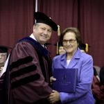 WEST PLAINS RESIDENT PEGGY KISSINGER received an honorary Associate of Arts degree Saturday, May 17, during Missouri State University-West Plains’ commencement ceremony at the West Plains Civic Center arena. She received her degree from Missouri State-West Plains Chancellor Drew Bennett. (Missouri State-West Plains)
