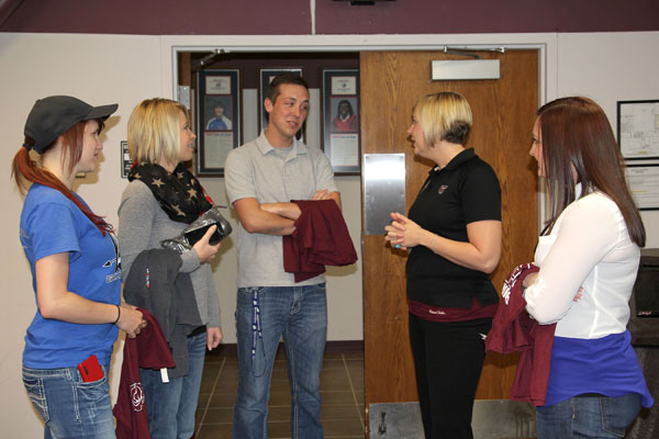 TWENTY-THREE Missouri State University-West Plains graduates who plan to transfer to Missouri State University in Springfield this fall were treated to a reception following commencement practice May 16 at the West Plains Civic Center. Graduates visited with Dixie Williams, transfer coordinator at Springfield and enjoyed refreshments. From left are Missouri State-West Plains graduates Amanda Justus of Vienna, Amanda Moody of Mansfield, Cody Skidmore of Conway, Williams, and Sarah Agee of Conway. (Missouri State-West Plains Photo)