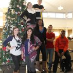 STUDENTS from the Future Alumni Organization with the tree for the 9th annual tree lighting ceremony include front row from left, Allison Sweatt, Camdenton; Jahmia Jujan, Dixon; Danisha Hogue, St. Louis; Zach Kaufman, West Plains; and Young. Back row: Reagan Caldwell, Plato; and TJ Wallis, New Bloomfield. (Missouri State-West Plains photo)