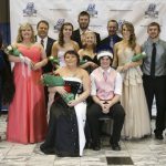 MEMBERS OF THE 2015 Missouri State University-West Plains Homecoming Court gather around this year’s king and queen in the lobby of the West Plains Civic Center for photos following the crowning, which took place at halftime of the Jan. 17 basketball game between the Grizzlies and Three Rivers College Raiders of Poplar Bluff, Mo. Seated are 2015 Grizzly Homecoming Queen Emily Yeager, Dora, and King Lance Parker, Dixon. Standing from left are Ms. Grizz (Ashton Garner, West Plains); 2015 Homecoming King and Queen candidates Ashley Howell, West Plains; Shannon Ford, Mtn. View; Kimberly Allen, Summersville; Cody Tompkins, West Plains; Kendra Barnard, St. Charles; Regan Riggs, West Plains; Ashley Rieken, Ava; and Trevor Cressman, West Plains; and Grizz (Sam Dodson, West Plains). (Missouri State-West Plains Photo)