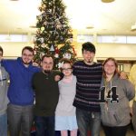 APPROXIMATELY 50 students, faculty, staff and community members gathered Wednesday afternoon in the lobby of the Lybyer Technology Center on the Missouri State University-West Plains campus to ring in the holiday season with the annual tree lighting ceremony hosted by the university’s Future Alumni Organization student group. Those attending enjoyed holiday songs sung by members of the West Plains Elementary School choir and refreshments, including hot cocoa. With the tree above are students, from left, Nathan McCoy, Plato; Alex Pershing, Laquey; Wesley Sanders, Willow Springs; Calley Dunnihoo, West Plains; Chris Godas, Columbia; Katie Henson, Stoutland; and Missouri State-West Plains Director of Development Joe Kammerer. (Missouri State-West Plains Photo)