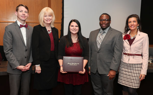 VICTORIA “TORI” YORK, center, Highlandville, a May 2015 graduate of Missouri State University-West Plains and a senior at Missouri State-Springfield, was one of six students who received the 2016-17 Citizen Scholar Award presented today, Dec. 15, by the Missouri State University Board of Governors. The award, established in fall 2007, is given annually to students “who exemplify the concept of a citizen scholar,” university officials said. With York above are, from left, board members Kendall Seal, Kansas City, and Virginia Fry, Springfield; student board member Tyree Davis, Springfield; and board member Carrie Tergin, Jefferson City. (Missouri State-West Plains Photo)