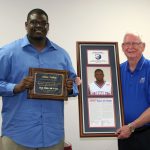 FORMER GRIZZLY Basketball standout Travis Parker, left, was inducted into the Grizzly Hall of Fame by Missouri State University-West Plains and Grizzly Booster Club officials during the annual Grizzly Sports Banquet/Hall of Fame Induction Ceremony Tuesday evening, April 10, at the West Plains Civic Center Magnolia Room. He was presented his award by Hall of Fame Selection Committee Chairman Ron Shemwell. (Missouri State-West Plains Photo)