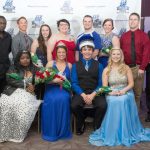 MEMBERS OF THE 2016 Missouri State University-West Plains Homecoming Court gather around this year’s king and queen in the lobby of the West Plains Civic Center for photos following the crowning, which took place at halftime of the Jan. 16 basketball game between the Grizzlies and Three Rivers College Raiders of Poplar Bluff. Seated from left are 2016 Homecoming Queen candidate Jayla Ray, Florissant; Queen Katelyn Grogan, Cabool; King Casey Buehler, West Plains; and Queen candidate Kendra Barnard, St. Charles. Back row: 2016 Homecoming King Candidates Kwamain Hall, Waynesville and Zach Kaufman, Dora; Queen candidate Sydney McBride, Lebanon; 2015 Homecoming Queen and King Emily Yeager, Dora, and Lance Parker, Dixon; 2016 Queen candidate Lindsay Randolph, West Plains; and King candidates William Hatcher and William Osborn, both of West Plains. (Missouri State-West Plains Photo).