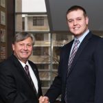 Chancellor Bennett congratulates Citizen Scholar Jared Cates.