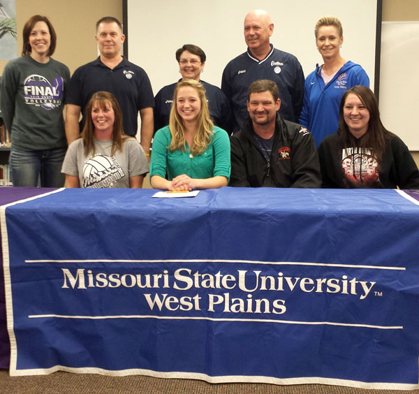 MIKALA HICKS, a 5-foot, 9-inch outside/right side attacker from Fair Grove High School in Fair Grove, Mo., has signed on to play volleyball with the Missouri State University-West Plains Grizzly Volleyball team beginning with the 2014 season. Hicks helped guide her Eagles team to a fourth place finish last fall in the 2013 Class 2A State Championships. She was a second-team all-state honoree her junior season and first-team all-state honoree this past year. She also has been named to the Missouri Academic All-State Team in 2012 and 2013 and was a first-team All-Mid Lakes Conference Team honoree her junior and senior year. As as senior, she had 323 kills, 4.1 kills per game, 305 digs, and 3.9 digs per game. On hand for the signing were, front row from left, her mother Marsha Hicks, Hicks, her father Gerald Hicks and her sister Monica Hicks; back row, Fair Grove Head Volleyball Coach Tonya Peck, Athletic Director Jason O’Neal, Club Bear Director Sue Daughtery, Club Bear Coach Jerry Schneider, and Grizzly Volleyball Head Coach Paula Wiedemann. (Photo provided)