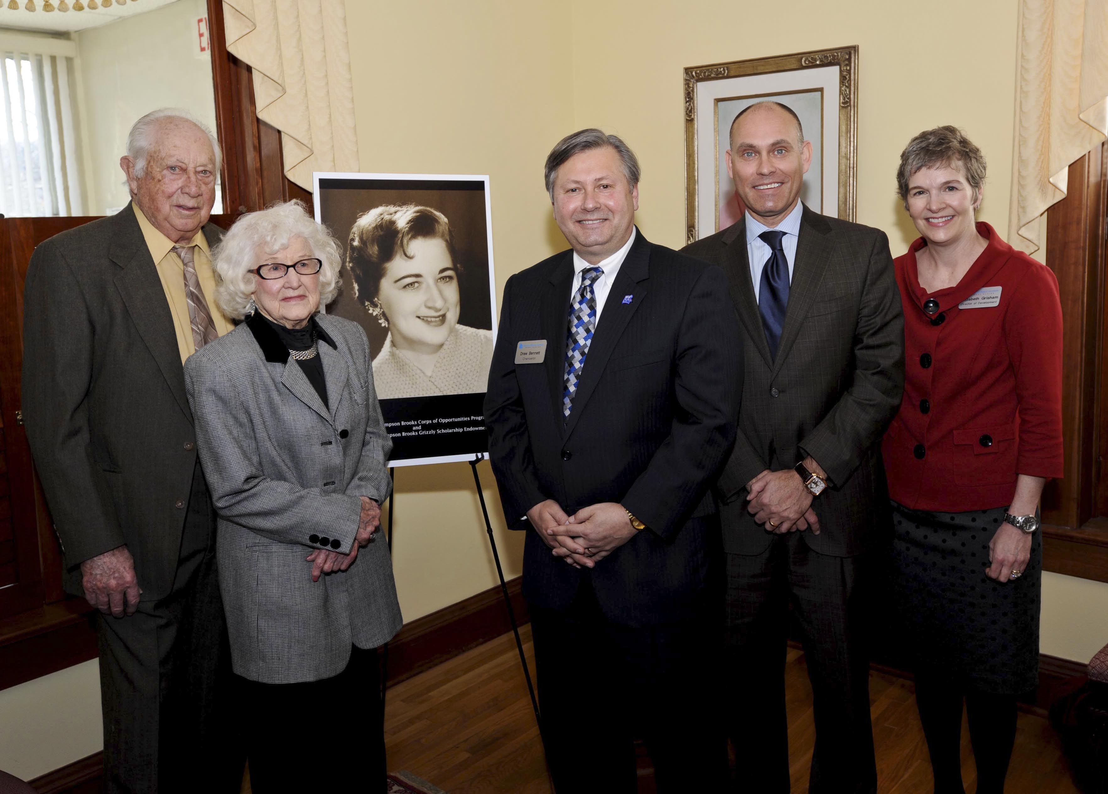 THE SINGLE LARGEST GIFT Missouri State University-West Plains has ever received and the single largest scholarship gift ever given to the Missouri State University system was announced at a press conference today, Feb. 23. The gift is from the Lorene Thompson Brooks estate. From left with a photo of Brooks are Brooks’ brother Bob Thompson and his wife, Eva, of West Plains; Missouri State-West Plains chancellor Drew Bennett; Missouri State University vice president for university advancement and executive director of the Foundation Brent Dunn; and Missouri State-West Plains director of development Elizabeth Grisham.
