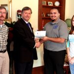 THE STUDENT GOVERNMENT Association (SGA) at Missouri State University-West Plains received the 2012 “most improved donor site for higher education” award from the Community Blood Center of the Ozarks (CBCO) in Springfield. The SGA sponsored two blood drives on campus this past year for the organization, doubling the number of usable units collected from the drive held in 2011, university officials said. With the award are, from left, Student Life & Development Coordinator Rogers Taylor, Chancellor Drew Bennett, SGA President Tony Ary and SGA Vice President Kristi Ary. (Missouri State-West Plains Photo)