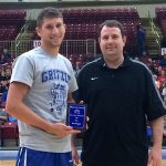 WYATT SUMMERS, left, Bakersfield, won the slam dunk contest at the annual Grizzly All-Star Classic Saturday, March 26, at the West Plains Civic Center. He receives his award from Missouri State University-West Plains Head Coach Yancey Walker. (Photo provided)