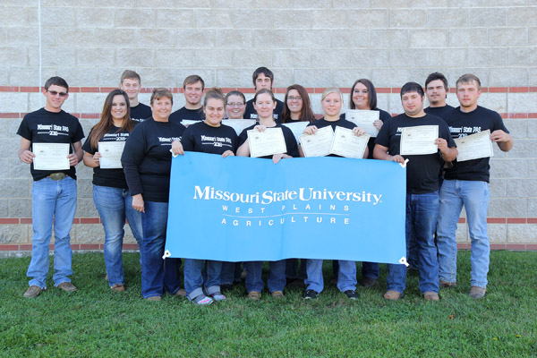 AGRICULTURE STUDENTS at Missouri State University-West Plains recently gathered several awards in competitions held as part of the 2016 Missouri Postsecondary Agriculture Student Organization conference Nov. 9-11 in West Plains. With their awards above are, front row from left, Dr. Linda Wulff-Risner, assistant professor of agriculture and group co-adviser; Haden Garrett and Dessa McBride, both of West Plains; Samantha Janes, Couch; and Benjamin Blank, Richmond. Second row: Michaela Silva, Gainesville; Audrey McClellan, Willow Springs; Bailey McCully, West Plains; Keshia Wilson, Licking; and Shawn Lewis, Moody. Back row: Bryce King, Alton; Mitchell Elkins, Ozark; Casey Watkins, Caulfield; Kyle Wilson, Houston; and Cordale Foster, West Plains. Liz Baty, Alton, Christine Jordan, Willow Springs, Jaden Hicks, West Plains, and Matthew McEntire, Pomona, also competed at the conference. Assistant Professor of Agriculture/Entrepreneurship Cathy Proffitt-Boys assisted with the event. (Missouri State-West Plains Photo)