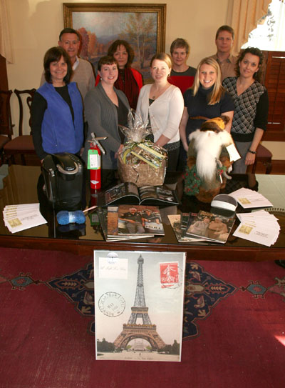 THESE AND MANY OTHER ITEMS already have been donated for Missouri State University-West Plains’ 18th annual auction April 13 at the West Plains Civic Center exhibit hall. With the items above are, front row from left, auction committee members Cindy McFarland, Amanda Niemotka, Jessi Long, Jackie Grisham and Terry Hampton. Back row: Auction committee members Bob Eckman, Kathy Schloss, Elizabeth Grisham and Joe Kammerer. (Missouri State-West Plains Photo)