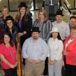 OFFICIALS AT MISSOURI State University-West Plains are tipping their hats to Physical Therapy Specialists Clinic (PTSC) for being a bronze level sponsor of the annual auction April 11 at the West Plains Opera House. The auction is celebrating its 20th year this year with a “Mad Hat” theme, and everyone is encouraged to wear their favorite funny hat. Tickets for the auction are $35 each or $350 for a reserved table of eight. Funds raised will go toward expanding the footprint of the campus, university officials said. Visit http://wp.missouristate.edu/development/auction.htm to purchase tickets and see a list of auction items. Front row from left are PTSC representatives mary Sheid, Brandon Wielert, Ronnica Warren, Robb Cox and Cyndi Badolian; auction committee member Barbara Nyden; PTSC representative Vallie Rogers; and Amanda Niemotka and Melody Hubbell of the university’s development office. Back row: PTSC representatives Randy Hawkins, Vince Beam, Susie Ray, Tammy Bark, Jeannie McGowan, Jordon Sheldon, Elizabeth Bisoux, Crystal Kennedy, Chris Green and Denny Franks; Joe Kammerer, the university’s director of development; and PTSC representative Brenda Miller. (Missouri State-West Plains Photo)