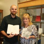 MISSOURI STATE UNIVERSITY-West Plains Associate Professor of English Anthony Priest recently donated 20 poetry books, autographed by their authors, from his personal collection to the Garnett Library. He hopes the collection, which includes works by Pulitzer Prize-winning authors, National Book Award for Poetry winners and a former poet laureate, inspiries student writers and gives them insight into the types of writing faculty enjoy. Priest holds a copy of Sonata Mulattica: A Life in Five Movements and a Short Play by Pulitzer Prize-winning poet and former United States Poet Laureate Rita Dove, and Garnett Library Director of Library Services Sylvia Kuhlmeier holds copies of The Secret Names by the late Michael Burns, former Missouri State University professor and director of the creative writing program in Springfield and Under the Sycamore by Missouri State-West Plains per course faculty member Dave Malone. The books are on display in the special/rare books collection, and additional copies of several of the books are available for circulation. (Missouri State-West Plains Photo)