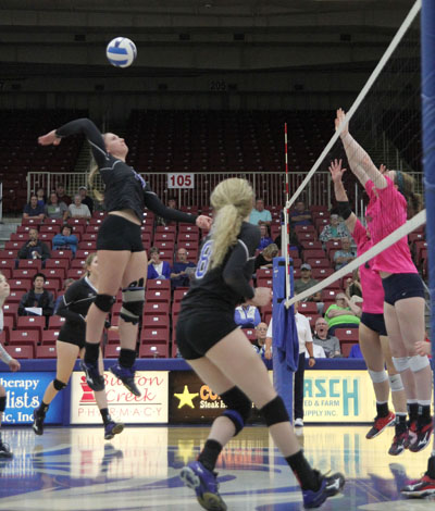 FRESHMAN OUTSIDE HITTER Catja Weijzen goes for a kill during Friday’s game against Jefferson College in the Lazy W Pallets/Colton’s Steakhouse and Grill/City of West Plains/West Plains Civic Center Grizzly Invitational Volleyball Tournament at the civic center. Weijzen led the Grizzlies in kills with 54 for the weekend. Looking on are freshman middle attacker Rachel Holthaus (No. 8) and sophomore outside hitter Stephanie Phillips (behind Weijzen). (Missouri State-West Plains Photo)