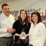 Graduate Rebekah Allen of Summersville with her parents, Gary and Patricia, and her Citizen Scholar Award