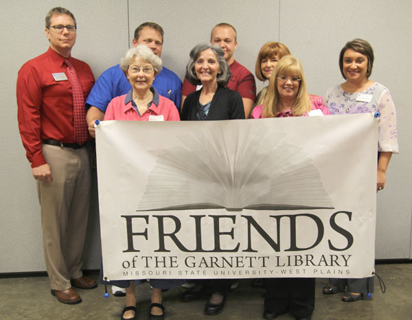 MEMBERS OF THE FRIENDS of the Garnett Library’s Executive Committee welcomed Amy Ackerson, director of allied health programs at Missouri State University-West Plains, and nursing students Shannon Ford, Mtn. View, and Keegan Harper, West Plains, to their first meeting of the year Sept. 12. The trio spoke to the Friends about the various allied health programs offered by the university and gave first-hand accounts of their experiences. Front row from left, Friends publicity chair Carolyn Brill and vice president Ruth Hall, and Garnett Library Director of Library Services Sylvia Kuhlmeier. Back row, Missouri State-West Plains Director of Development Joe Kammerer, Ford, Harper, Friends President Linda Keefe, and Ackerson. Other Friends officers include secretary Pat Smith, membership chair Carol Silvey and past president Kay Garrett. (Missouri State-West Plains Photo)