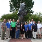 THE GRIZZLY BOOSTER CLUB’S annual membership drive is underway, and already several new faces can be found among its ranks, including Powell and Anita Humphries of Thayer and Scott Schneider, director of business and support services at Missouri State University-West Plains. Others who have been welcomed to the group by the club’s executive board of directors include Brill Title Company, Whetstone Veterinary Services, Eco Recovery LLC, Morlan-Shell Ford, Brian and Sarah Powers, JB’s Healthmart, Mat and Caitlin Crouse, Potter’s Dawg House and Westgate Carol Jones Realtors. Area residents intersted in learning more about the club and its support of Missouri State-West Plains Grizzly Athletics should contact Dr. Herb Lunday, dean of student services, at 417-255-7255 or HerbLunday@MissouriState.edu. Above are, from left, Tom Marhefka, owner of Ozark Radio Network and Ozark Horsetrader and current booster club president; Grizzly Basketball Assistant Coach Chad VanRiessen; Lunday; Schneider; Powell and Anita Humphries; Carolyn Smith, booster club executive board member; Grizzly Volleyball Head Coach Paula Wiedemann; Gene Poppe, president of Wood & Huston Bank and booster club executive board member; Missouri State-West Plains Chancellor Drew Bennett; and Chuck Kimberlin, booster club executive board member. (Missouri State-West Plains Photo)