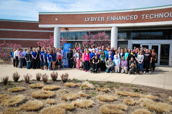 APPROXIMATELY 250 students, faculty, staff and community members gathered in front of Lybyer Technology Center at Missouri State University-West Plains Thursday afternoon to celebrate the donation of more than 50,000 hours of community service as part of the Operation 50K initiative. The year-long initiative, begun following 2013 commencement ceremonies, was designed to commemorate the campus’ 50th anniversary while celebrating its public affairs mission. “We believe serving our communities is a great way to say thanks,” Chancellor Drew Bennett said at the announcement. As of Thursday afternoon, over 51,000 hours had been recorded. Bennett encouraged everyone to continue reporting their hours online on the Operation 50K website until the May 17 deadline. A final tally will be announced that day at commencement, he said. (Missouri State-West Plains Photo)