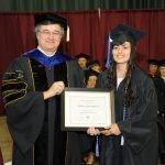 PERLA QUINTANA, Rogers, Ark., received the Missouri League of Nursing’s Outstanding Student Award for Associate of Science in Nursing degree graduates at Missouri State University-West Plains commencement ceremonies Saturday, May 18, at the West Plains Civic Center. The award recognizes a graduate from the ASN program who exhibits exceptional leadership potential, interpersonal skills and continuing professional growth. Quintana will receive a one-year membership to the MLN. She received her award from Dean of Academic Affairs Dr. Christopher Dyer. (Missouri State-West Plains Photo)