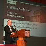 “WE HAD A GOOD YEAR last year, and we want to build on those achievements,” Missouri State University Interim System President Clif Smart said Tuesday, Sept. 11, in his annual “State of the University” address to approximately 150 Missouri State-West Plains faculty, staff, students and community members at the West Plains Civic Center theater. Building on success, however, takes time, consensus and the input of many people, he added, and pointed to 10 areas of focus for the current academic year that will aid in the process. Those areas include enrollment, funding, public affairs, diversity, student access and learning, graduate programs, profile, facilities, the IDEA Commons and Jordan Valley Innovation Center in Springfield, and marketing, the last of which will directly affect the other nine. “By that definition, marketing should be a high priority, not only for the Board (of Governors) and administration, but for each of us,” he said, adding a major initiative of this year will be to complete a marketing study for the university. “It will provide some much-needed research upon which we can better build our recruitment and fund-raising plans,” he added. (Missouri State-West Plains Photo)