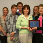 THE STAFF of Missouri State University-West Plains’ Department of Student Services won the “Highest Dollar Amount Raised” Award in the departmental contest at the university’s 18th annual auction April 13. This is the third consecutive year the department has won the award. On hand for the plaque presentation were, front row from left, Food Services Manager Mozella Jett, Student Life & Development Coordinator Rogers Taylor, Drago College Store Manager Kathy Schloss, and Director of Development Elizabeth Grisham. Back row: Coordinator of Financial Aid Donna Bassham, Coordinator of Admissions Melissa Jett, Grizzly Volleyball Head Coach Paula Wiedemann, Registrar Shanna Dale and Dean of Student Services Dr. Herb Lunday. (Missouri State-West Plains Photo)