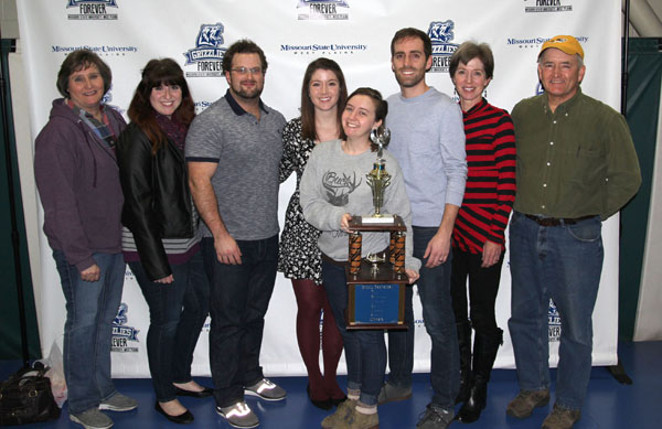 A GROUP OF LONG-TIME supporters of Grizzly Athletics and the annual Trivia Night fundraiser took top honors in the 14th annual Trivia Night benefitting Grizzly Athletics at Missouri State University-West Plains Jan. 28 at the West Plains Civic Center. With the traveling trophy awarded to the first place team are members, from left, Judy Carr, Amber Carr, Ethan Porter, Emma Ray, Becca Ray, Josh Ray, Melinda Ray and David Ray. (Missouri State-West Plains Photo)