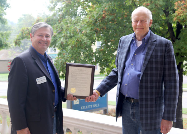 WEST PLAINS MAYOR JACK PAHLMANN, right, presents a framed proclamation from the City of West Plains honoring Missouri State University-West Plains on its 50th anniversary to Chancellor Drew Bennett. Noting many of the campus’ accomplishments, city officials commended Missouri State-West Plains “for its 50 years of providing quality educational opportunities in our area to improve the lives of its students and the regional citizenry.” The proclamation was signed by Pahlmann on Sept. 16, 2013, the day university officials hosted the 50th Anniversary Celebration, which marked the exact date 50 years ago the university began offering classes in West Plains. For more information about anniversary activities and events, visit the anniversary website, 50th.wp.missouristate.edu. (Missouri State-West Plains Photos)