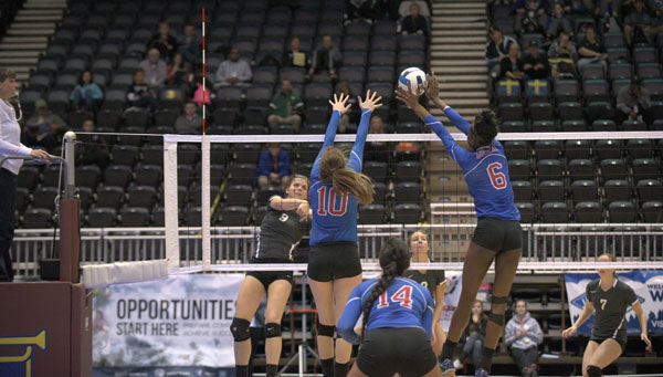GRIZZLIES ZORI CURRY (No. 6) and Gabby Edmondson (No. 10) go up for a block against a shot by North Idaho’s Matilda Altin (No. 9) during today’s first-round match at the NJCAA Division I Women’s National Volleyball Championship tournament in Casper, Wyo. Looking on are Grizzly Pulotu Manoa (No. 14) and North Idaho’s Jadan Ross (No. 3) and Brenna Meehan (No. 7). (Photo courtesy Will Gay)