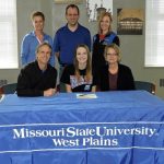 GRACE STUMBAUGH, a 6-foot, 1-inch middle attacker from St. Paul Lutheran High School in Concordia, has signed a letter of intent to play for the Missouri State University-West Plains Grizzly Volleyball team for the upcoming season. Stumbaugh was a honorable mention selection for the Class 2A All-State team during her senior season, and she earned I-70 All-Conference and All-Region honors her junior and senior years. “Grace can be a force at the net, and we are excited she will be on our side,” Grizzly Volleyball Head Coach Paula Wiedemann said. “Her ability to take swiings from anywhere makes us more versatile, and her presence on the floor makes a difference, as well. She has power and will be a lot of fun to watch. She adds to the depth of our incoming freshman class, and we could not be more excited to have Grace become a Grizzly.” On hand for the signing ceremony were, seated from left, Stumbaugh’s father, Rick; Stumbaugh; and her mother, Diana; standing, Wiedemann; St. Paul Lutheran Head Coach Aaron Marsh; and Grizzly Volleyball Assistant Coach Briana Walsh. (Photo provided)