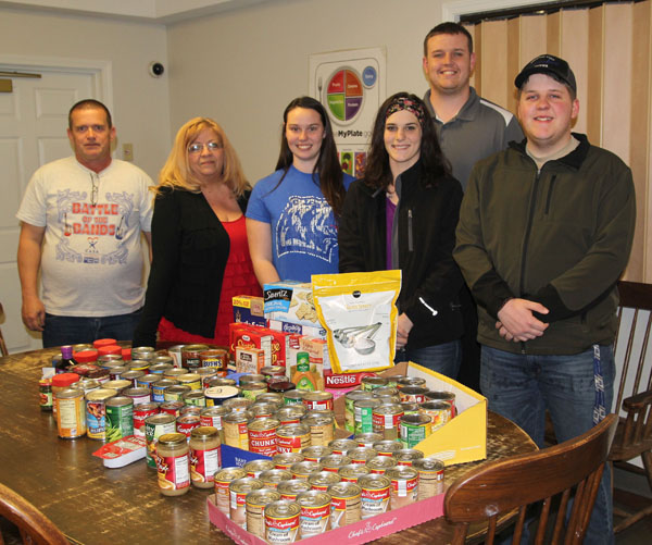 MEMBERS OF THE STUDENT Government Association (SGA) at Missouri State University-West Plains recently donated approximately 125 non-perishable food items collected during a recent campus food drive to the Martha Vance Samaritan Outreach Center (SOC) in West Plains. On hand for their delivery at the center were, from left, SOC Donation Coordinator James Barnes and Executive Director Lori Concepcion; SGA President Sydney McBride of Lebanon; SGA Historian Darby Hines of Willow Springs; Student Life and Development Coordinator and SGA Advisor Jared Cates; and SGA Chief of Staff Douglas Cooley, Plato. (Missouri State-West Plains Photo)